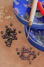 feather extension tools and beads